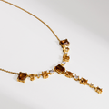 COLAR NUANCES MARROM GRAVATINHA DOURADO